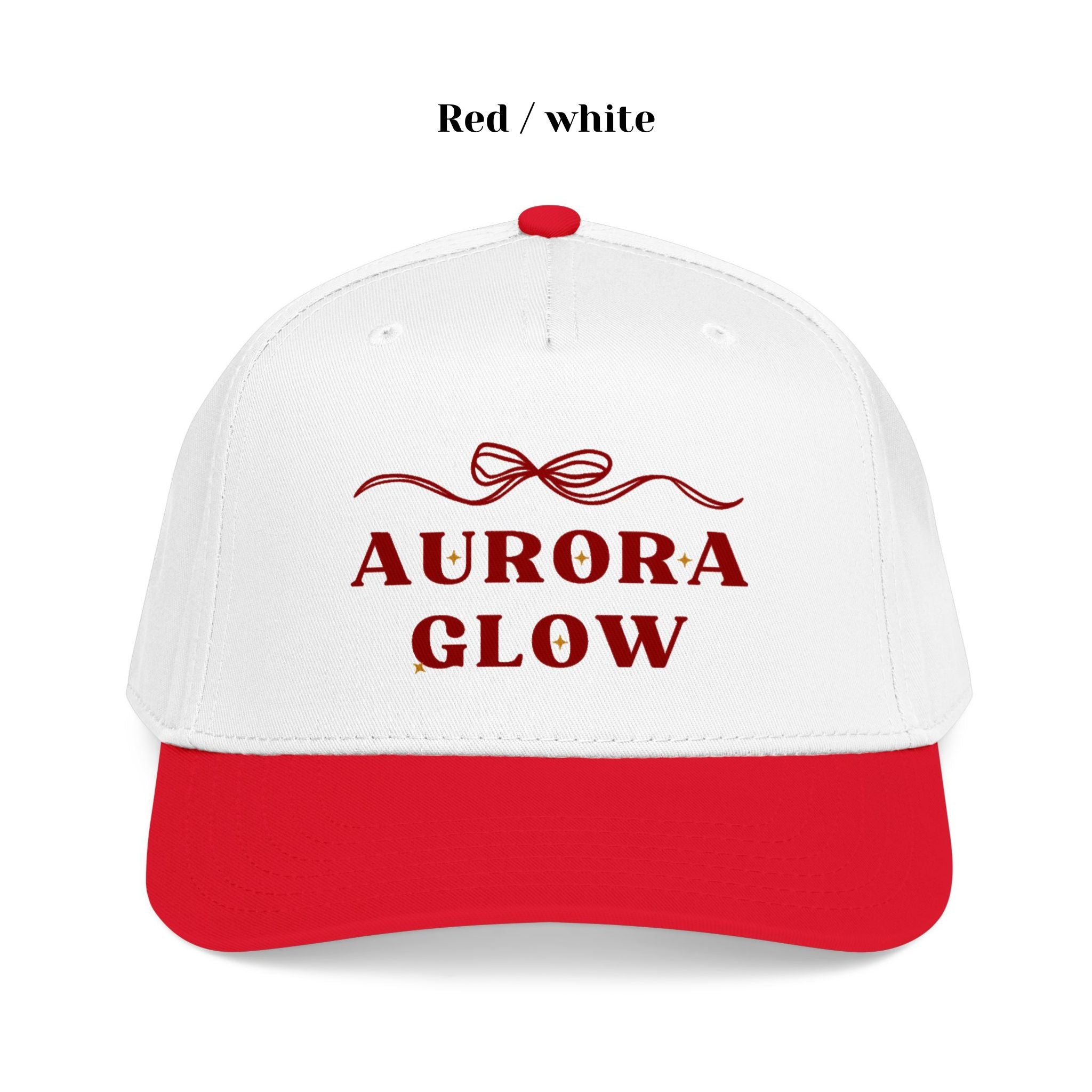 Aurora Glow Trucker Hat by Hello Aurie styled casually, featuring delicate bow graphic and vibrant DTF print