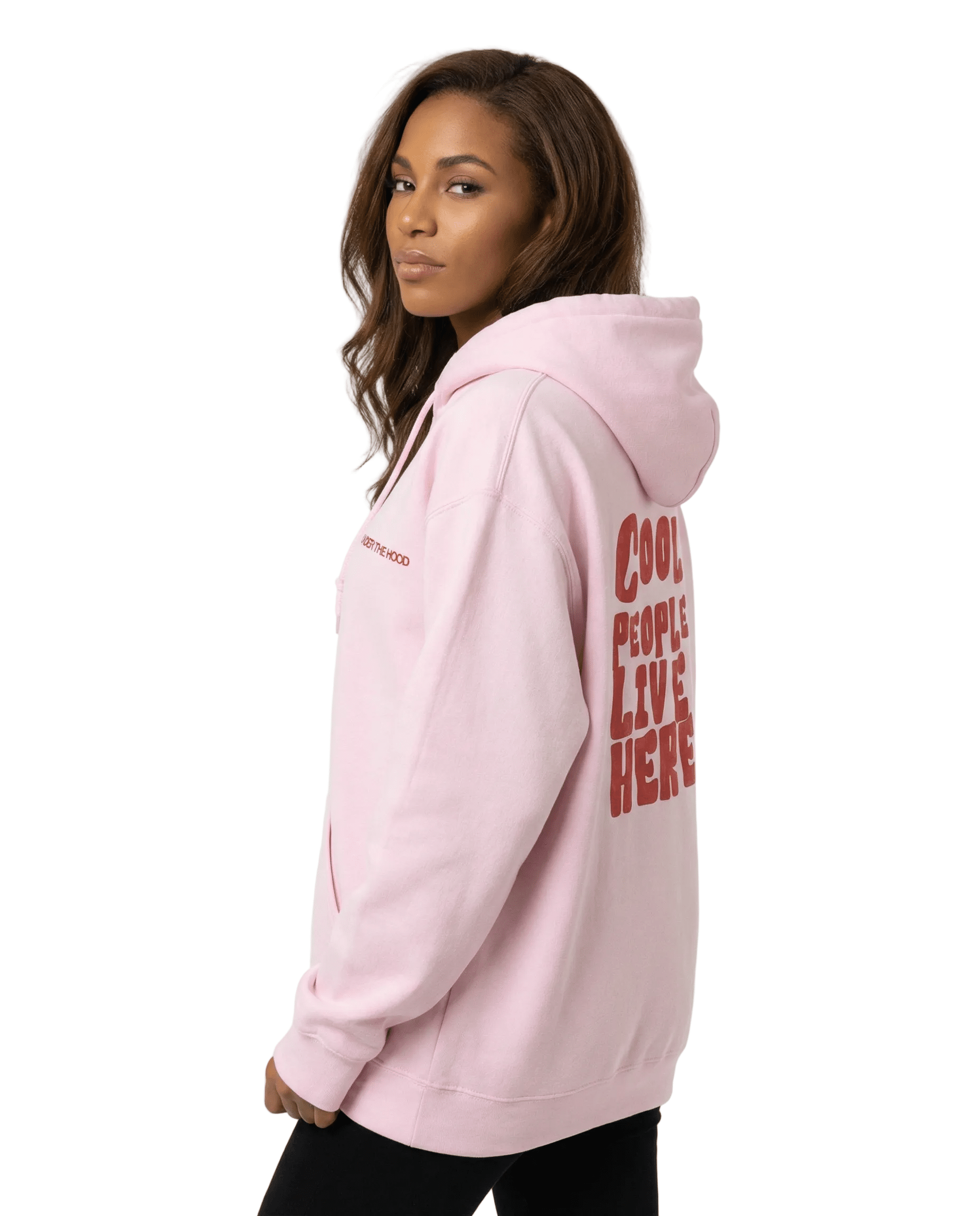 Model wearing Cool People Live Here unisex light pink hoodie, cozy statement sweatshirt for casual wear