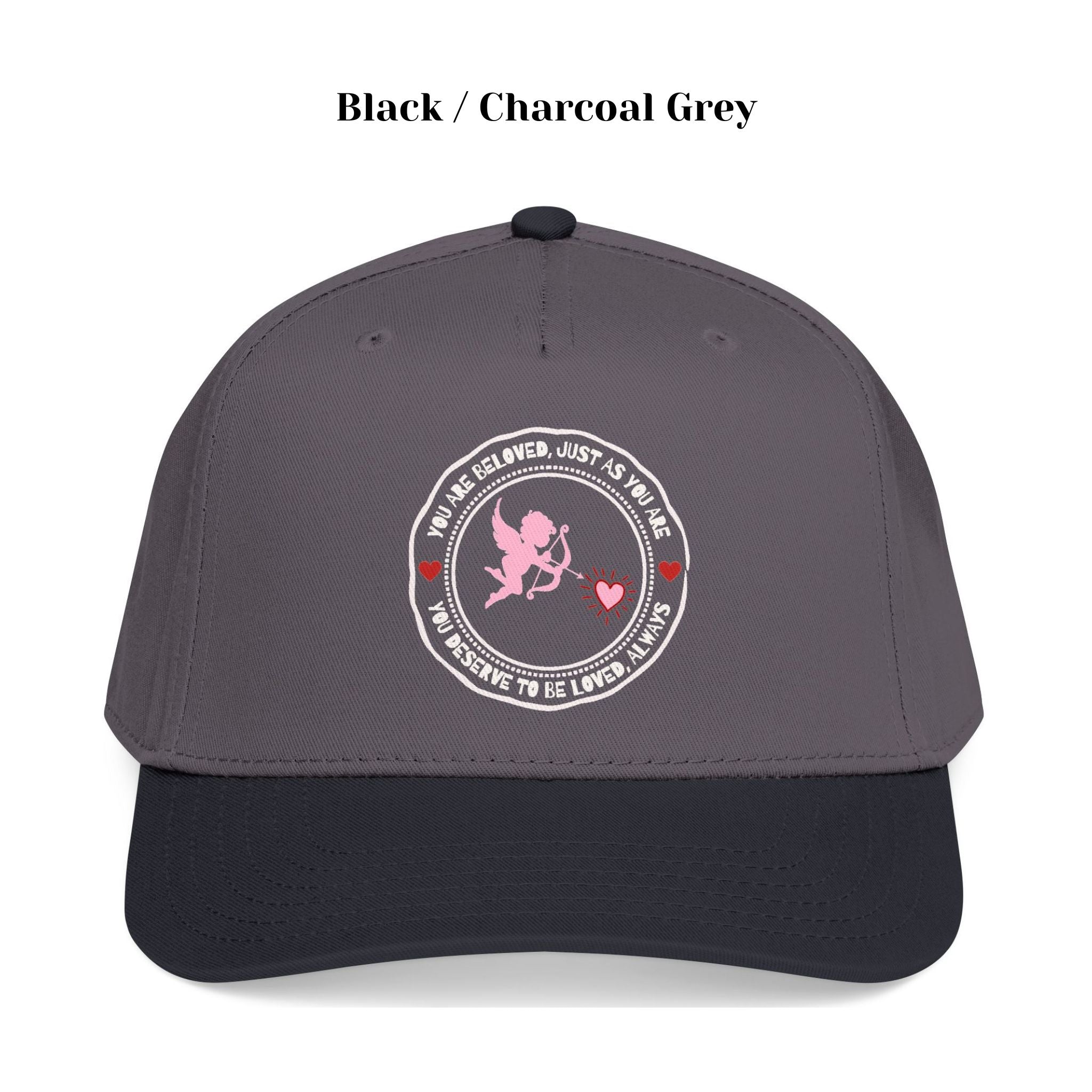 Front view of Cupid’s Embrace Trucker Hat with “You Are Beloved” embroidery in red heart design