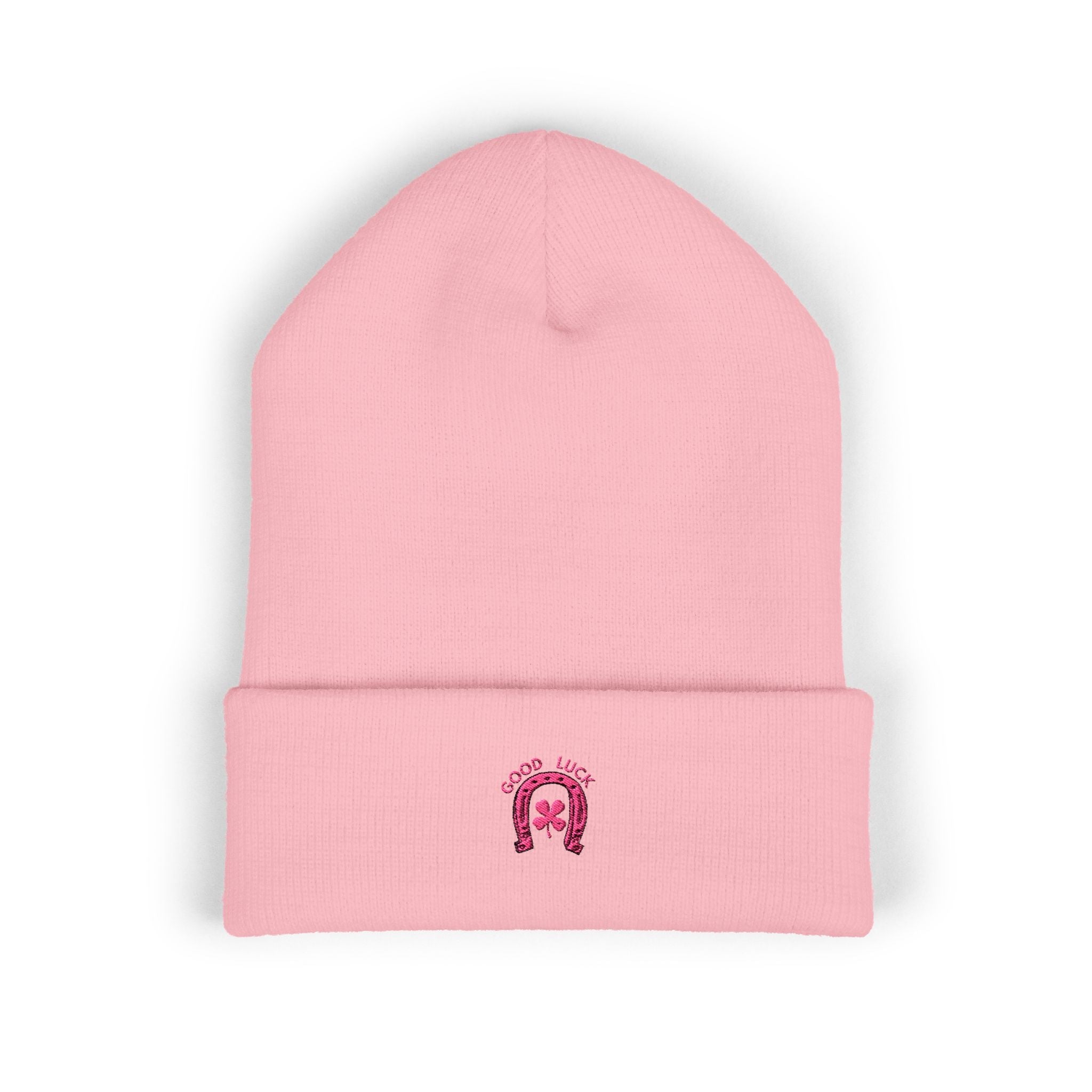 Minimal pink knit beanie featuring small good luck embroidery on cuff