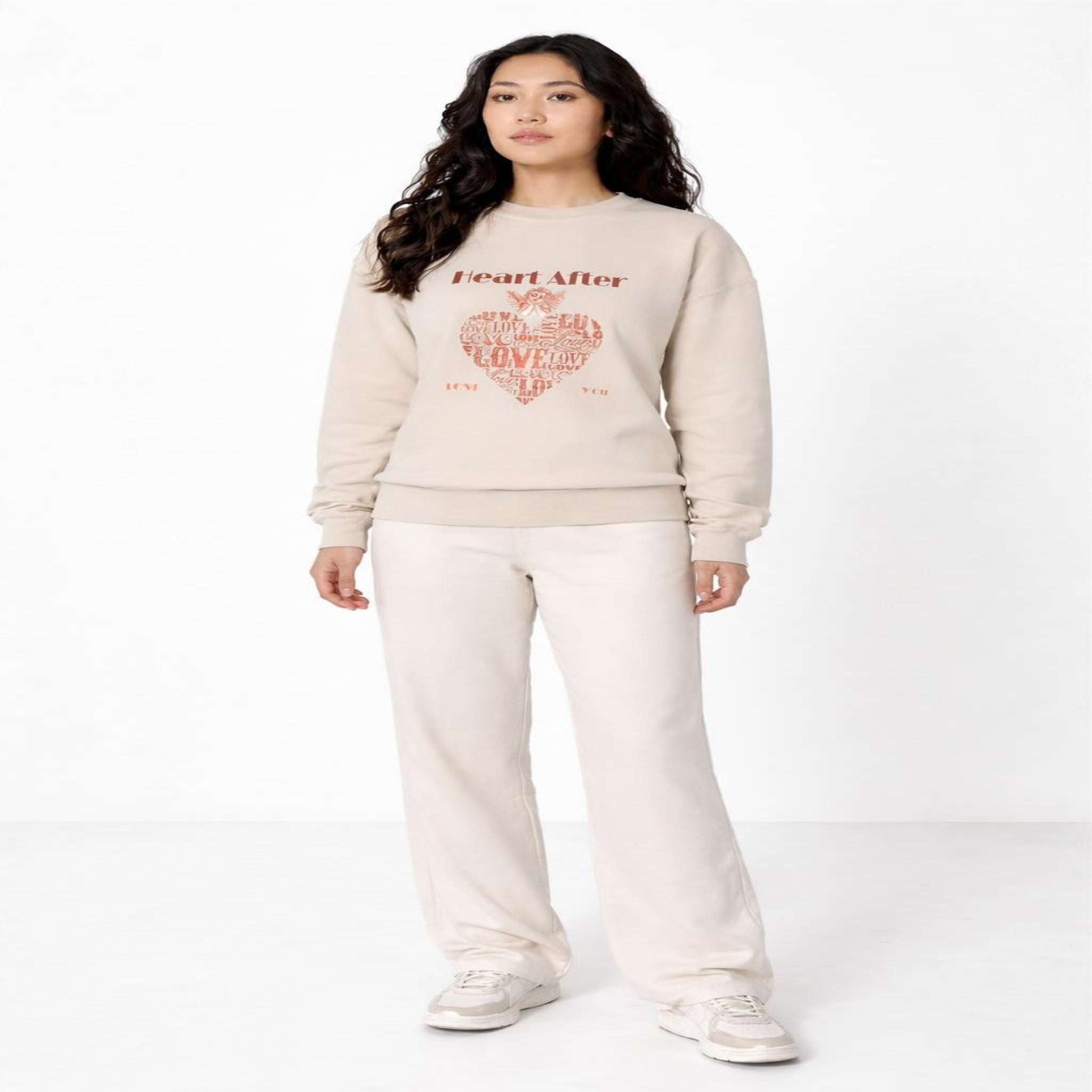 Graphic black sweatshirt featuring heart collage made of repeated “love” lettering.