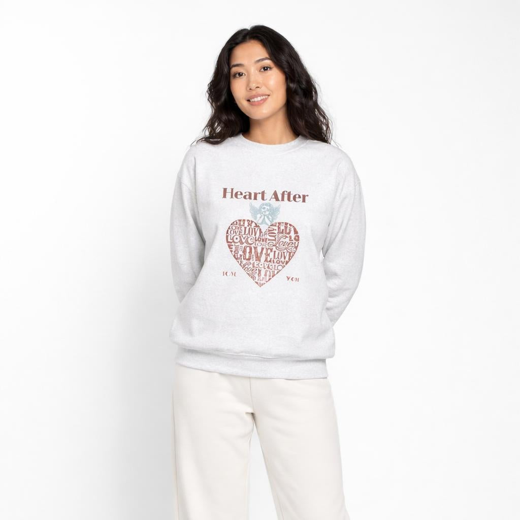 Streetwear-style black crewneck featuring bold “Heart After” typography and love heart artwork.