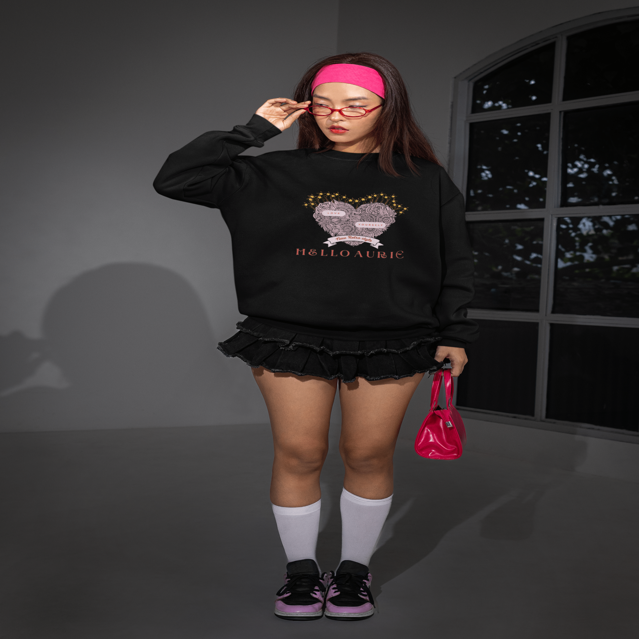 Cozy Hello Aurie crewneck sweatshirt with retro-inspired pastel accents for casual wear