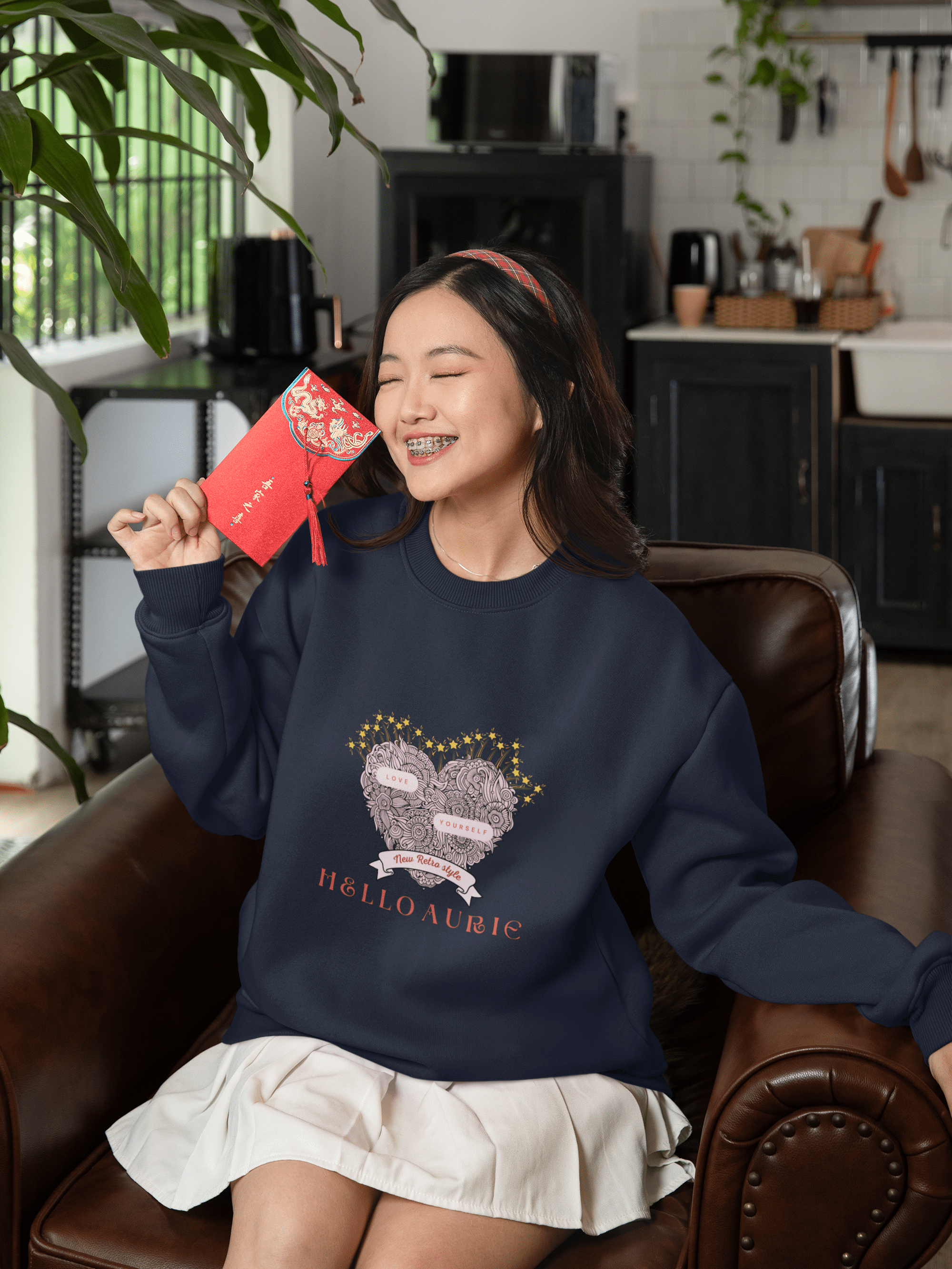 Front view of Hello Aurie Love Yourself Heart Crewneck Sweatshirt with pastel heart and star details