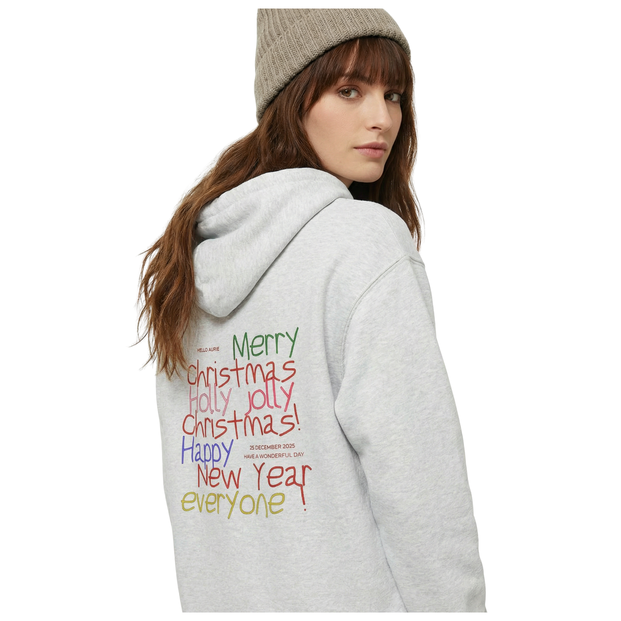 Person wearing a gray hoodie with colorful text on the back, standing against in ash 