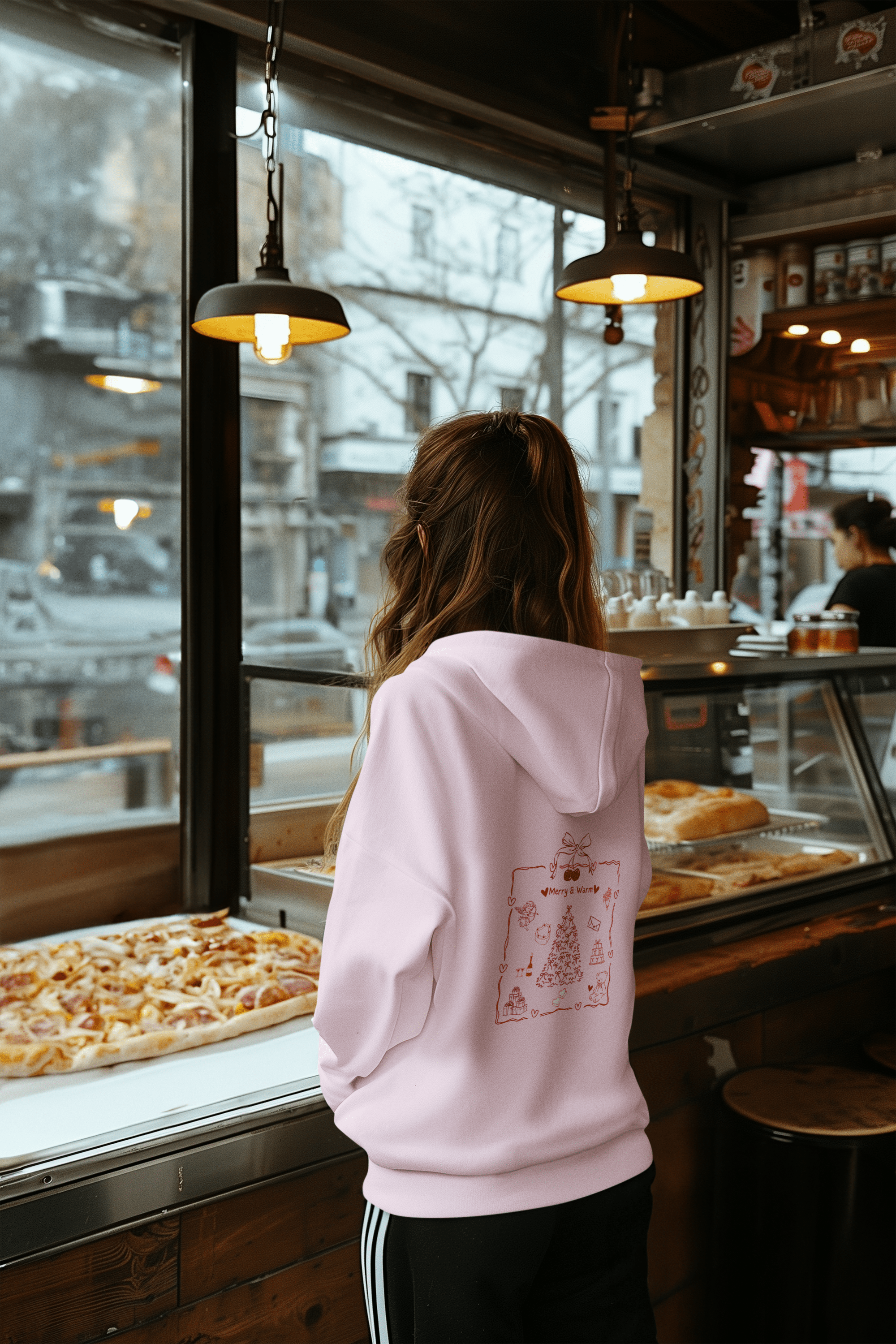 unisex hoodie featuring a festive red Christmas-themed design on the back