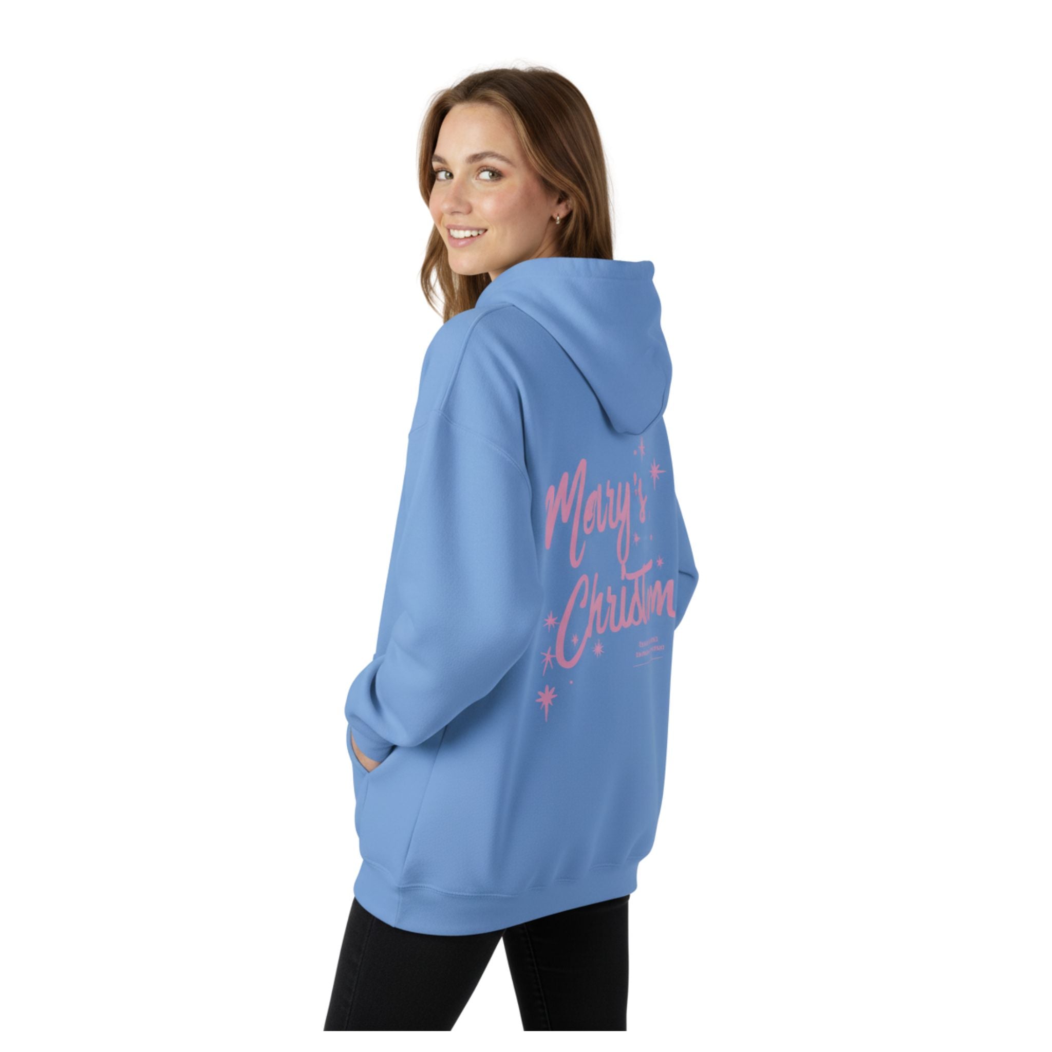 Woman wearing a blue hoodie with 'Merry Christmas' text on the back against a white background