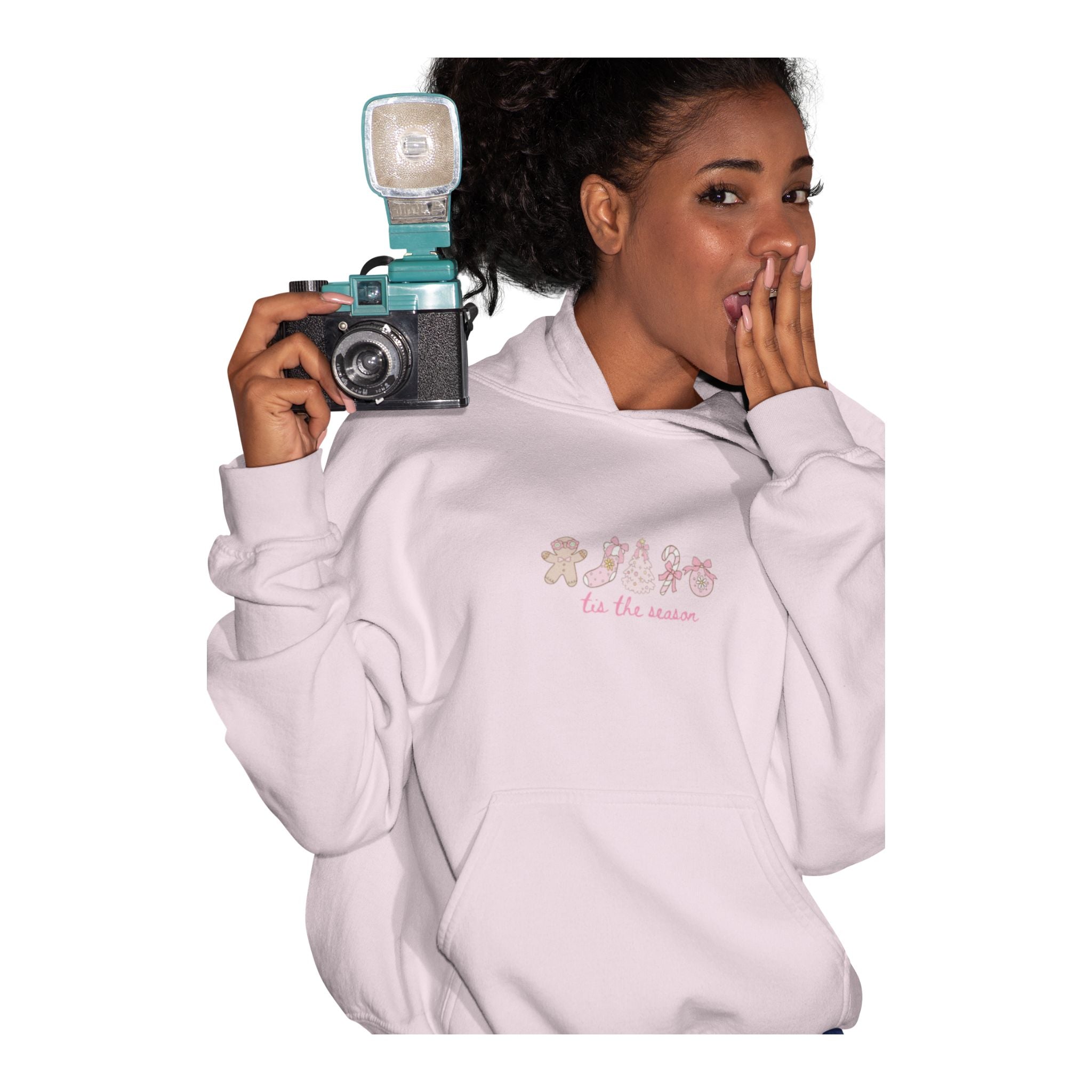 Model wearing ’Tis the Season holiday hoodie with festive graphic