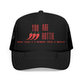 Front view of white trucker hat with red embroidery and playful spicy design